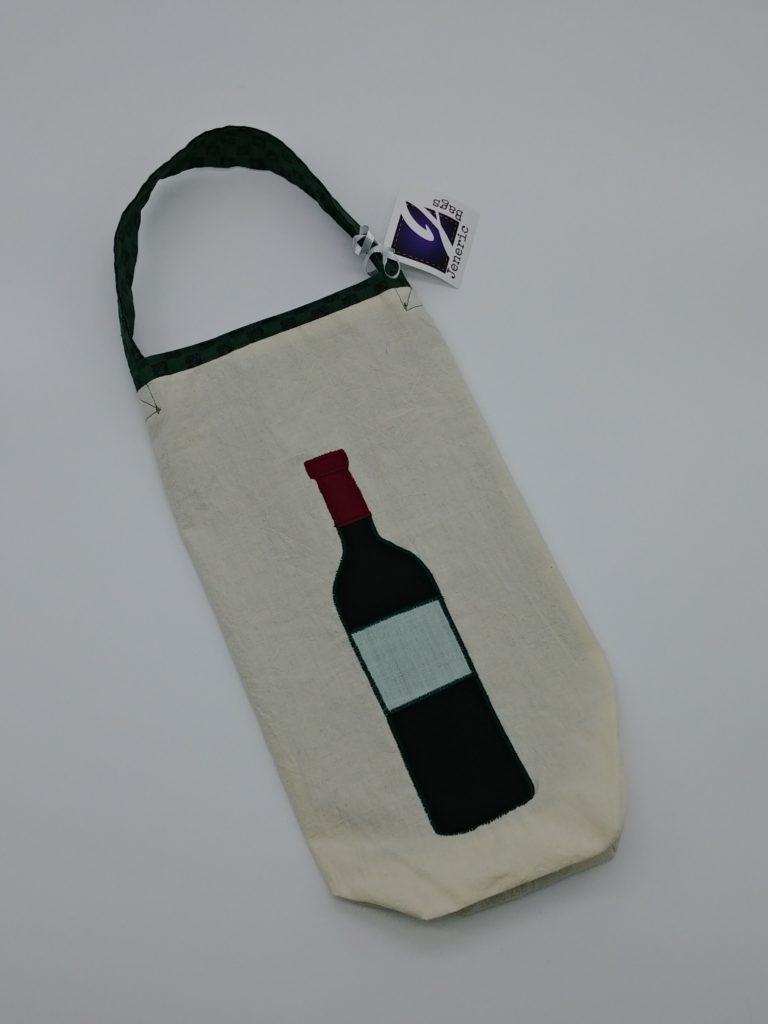 handbag that holds wine